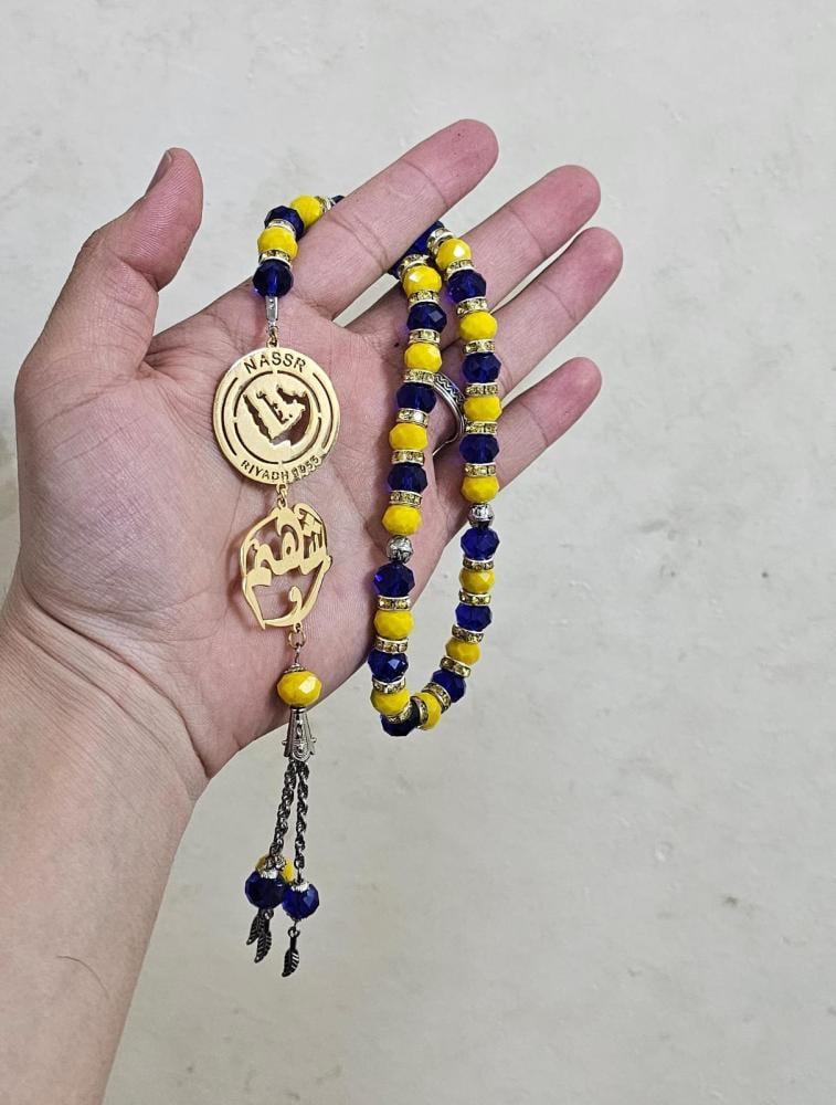 سبحة بالاسم مع شعار النصر الجديد