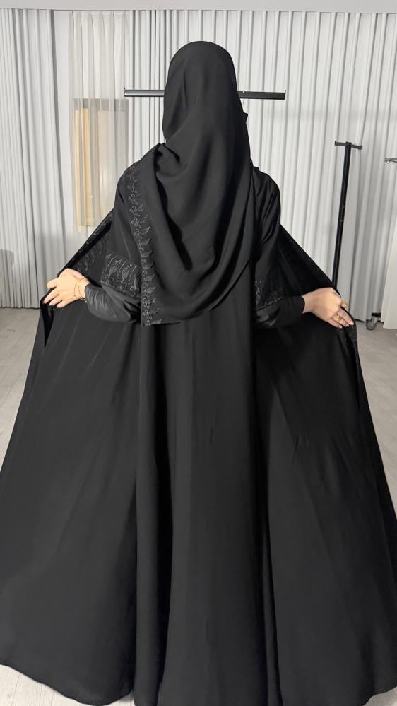 Tawq Abaya with its designs
