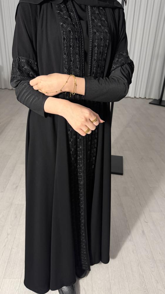 Tawq Abaya with its designs