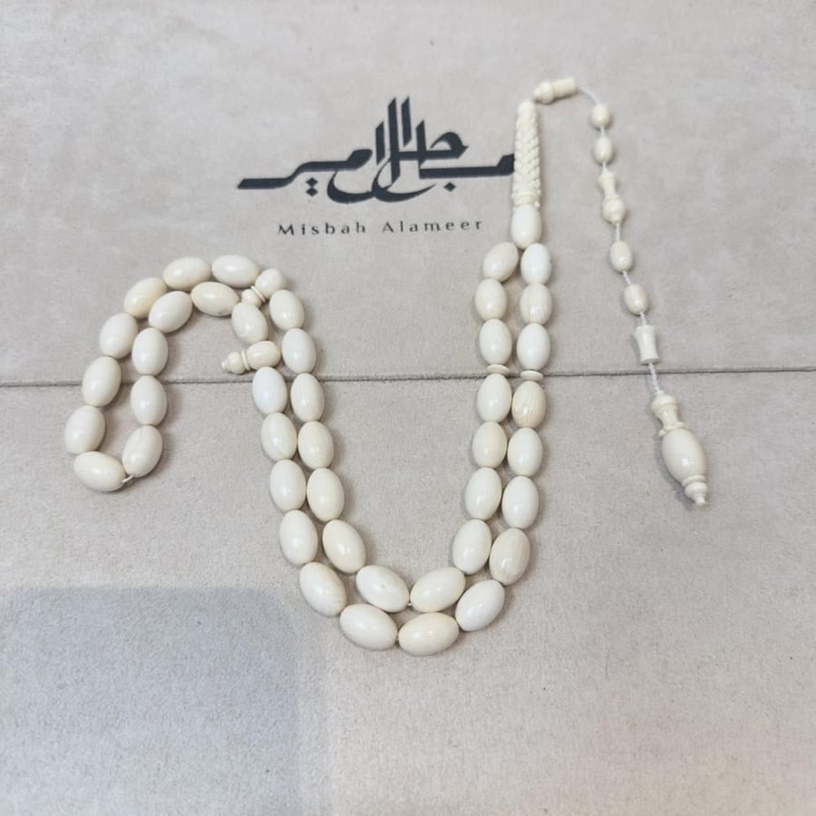 مسباح عاج من ناب الماموث وناب الفيل – قطعة نادرة لهواة الاقتناء