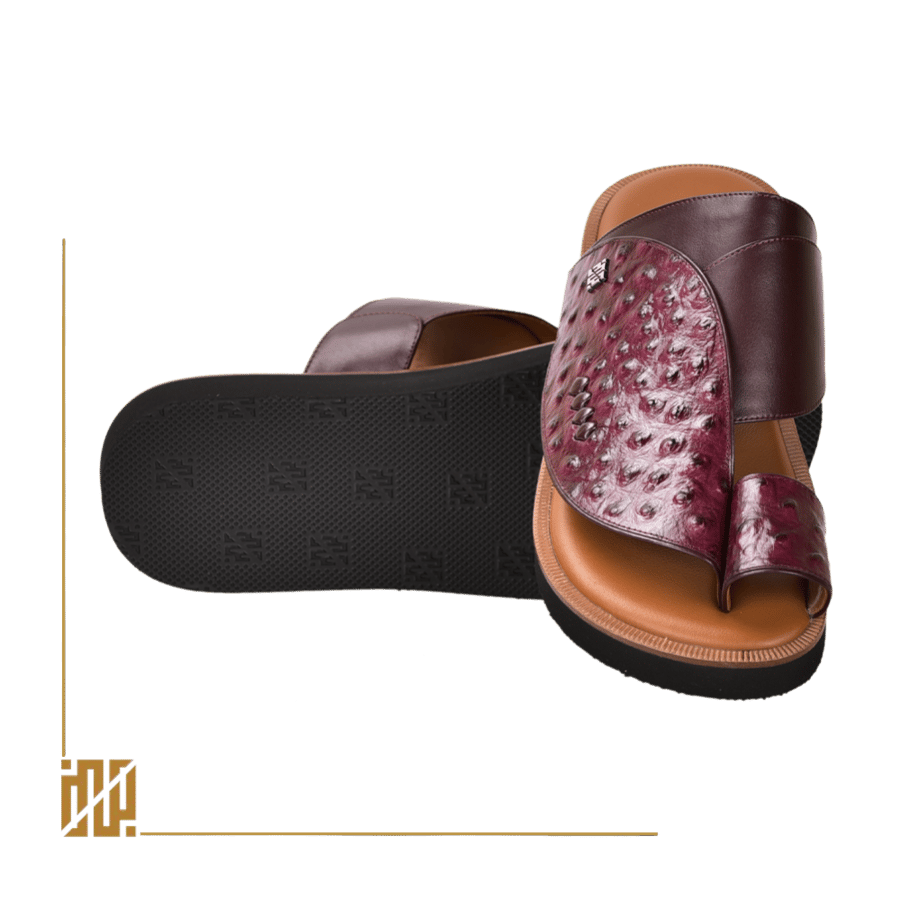 A shoe in the style of ostrich leather in burgundy color
