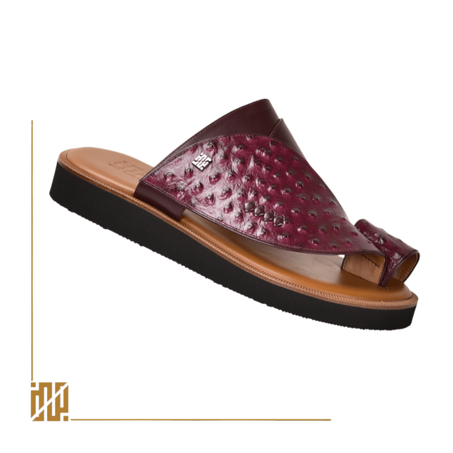 A shoe in the style of ostrich leather in burgundy color
