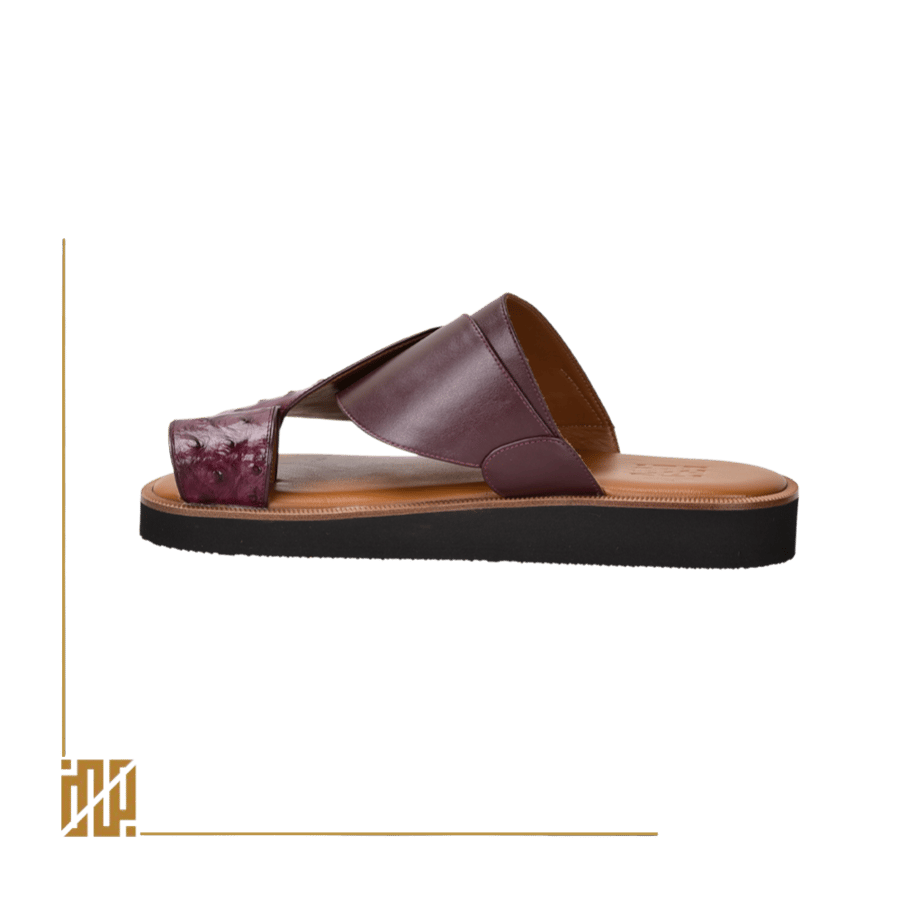 A shoe in the style of ostrich leather in burgundy color