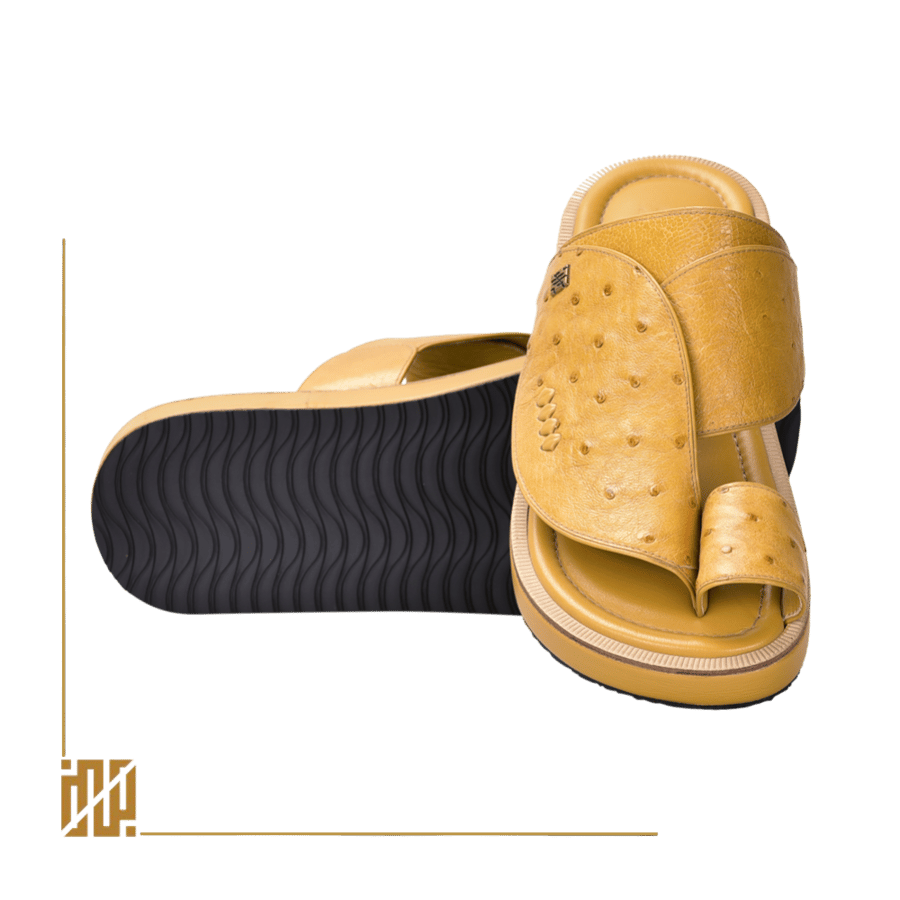 A shoe with a covering of ostrich leather in yellow.