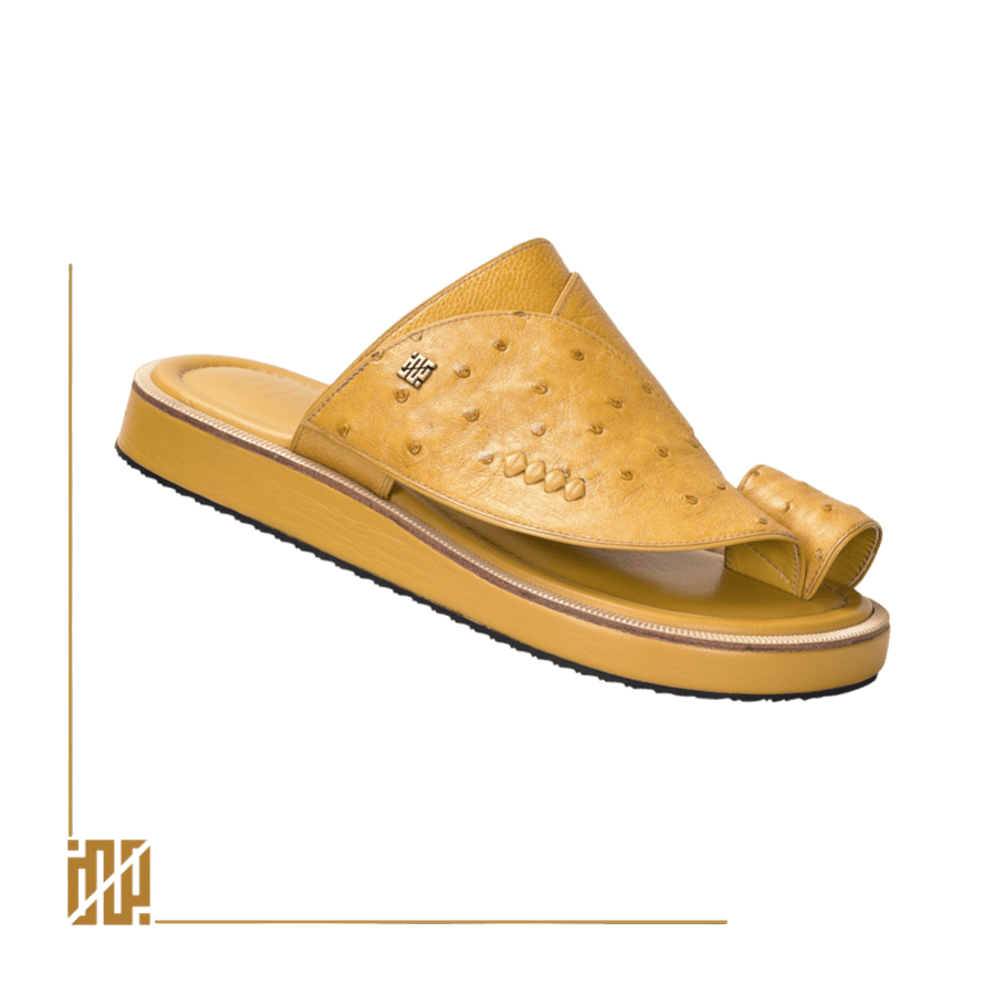A shoe with a covering of ostrich leather in yellow.