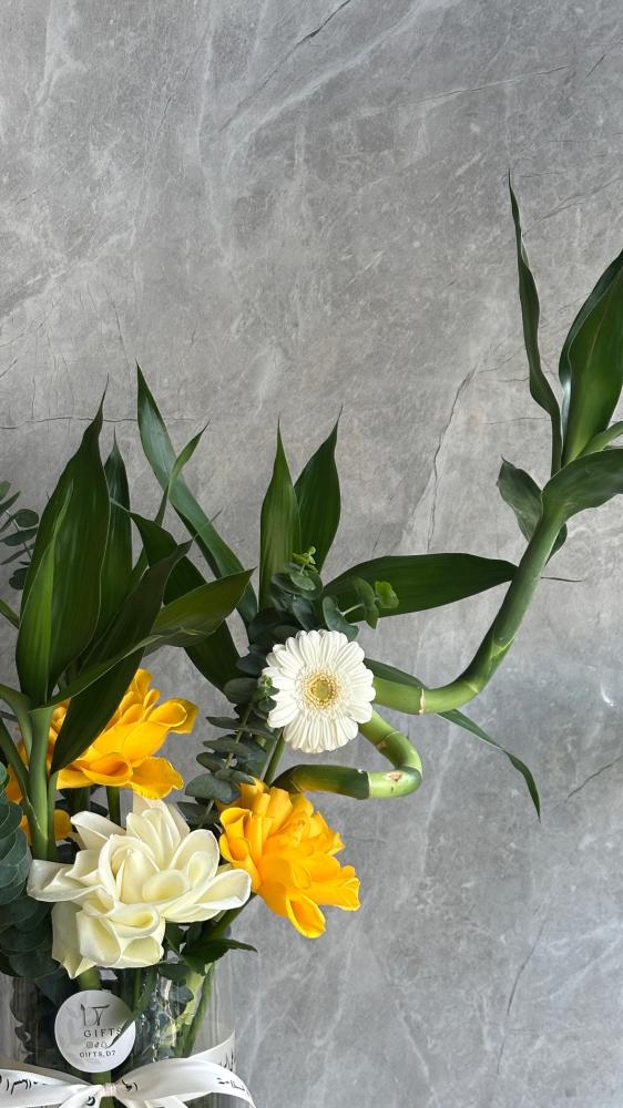 Bamboo vase with natural flowers