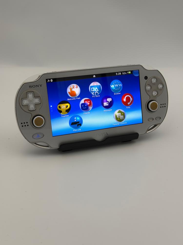 PS Vita OLED — Ice Silver (مع الشاحن) (نسخة نادرة)