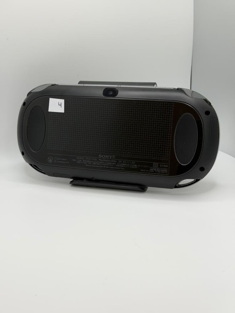 PS Vita OLED — Crystal Black (with charger)