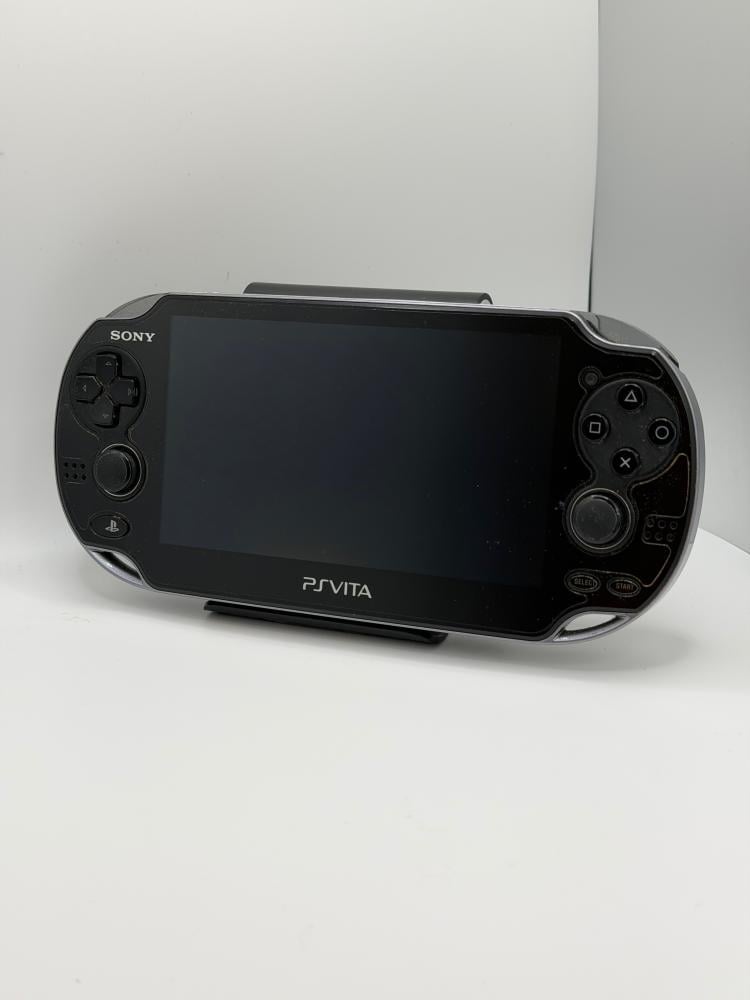 PS Vita OLED — Crystal Black (with charger)