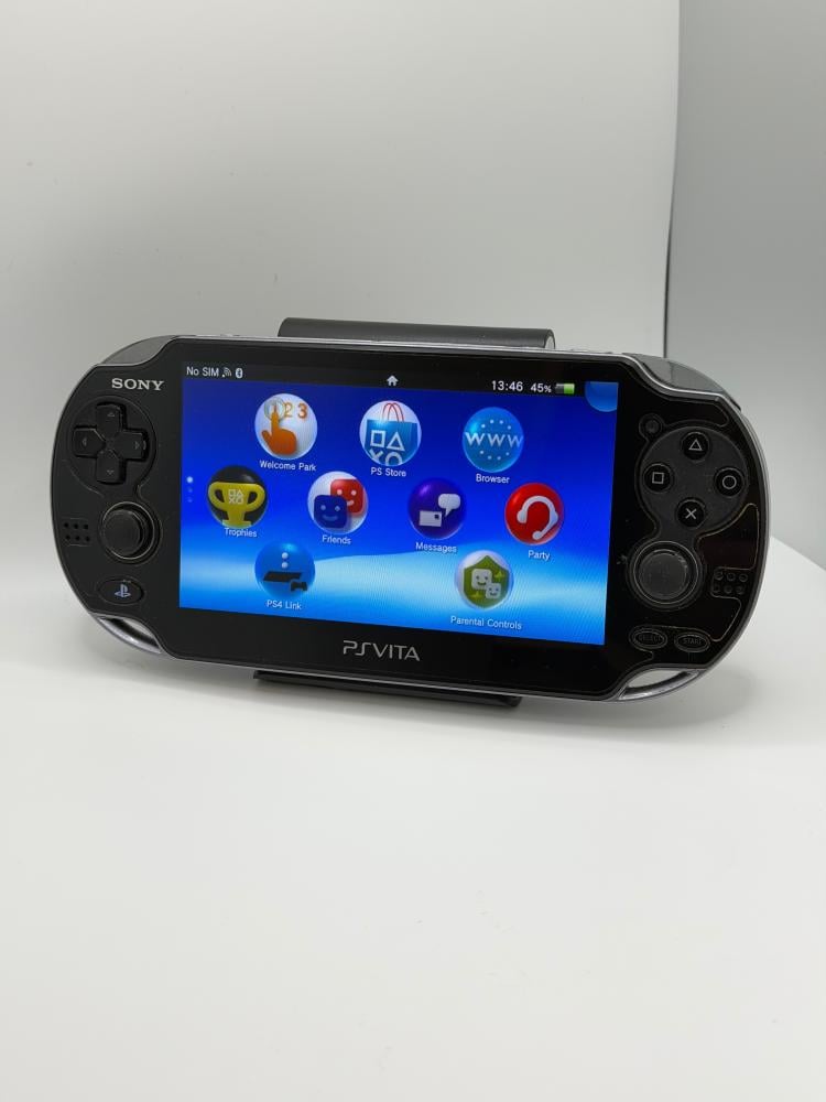 PS Vita OLED — Crystal Black (with charger)