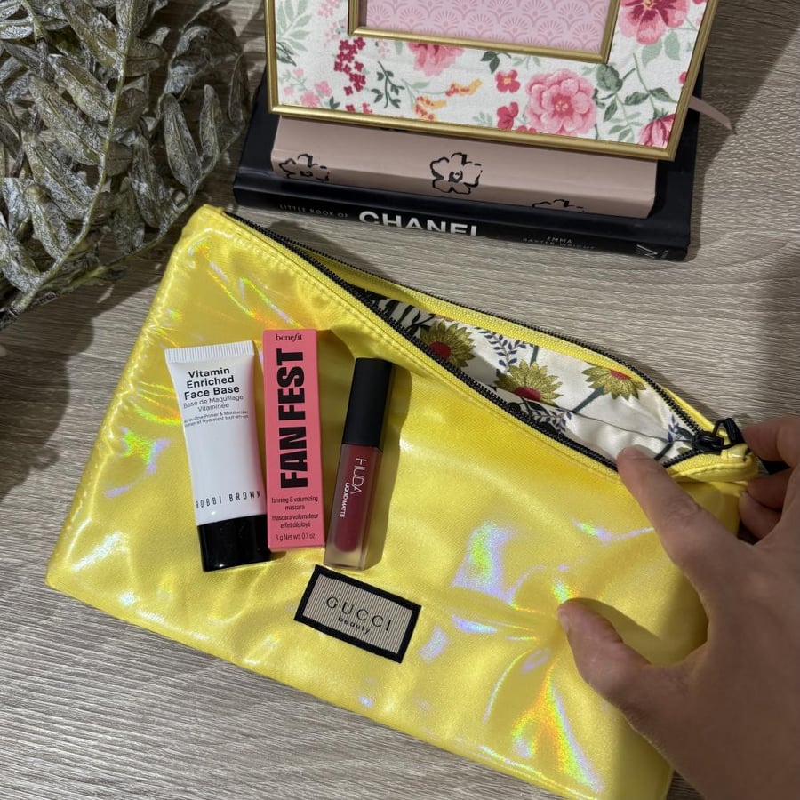 Goutshi filter package and small Muskara and small Huda Beauty lipstick and face cream from Bobbi Brown
