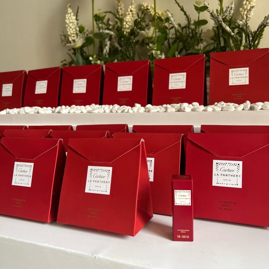 10 Cartier original perfumes inside separate bags with high quality and a prominent gold fingerprint logo (perfumes only are authentic)