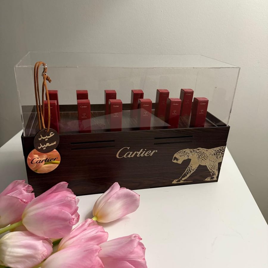 Package for all occasions box contains 12 Cartier exclusive small perfumes
