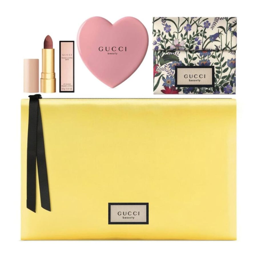Gucci package yellow decorated from inside with pink mirror in embroidered fabric case and small lipstick