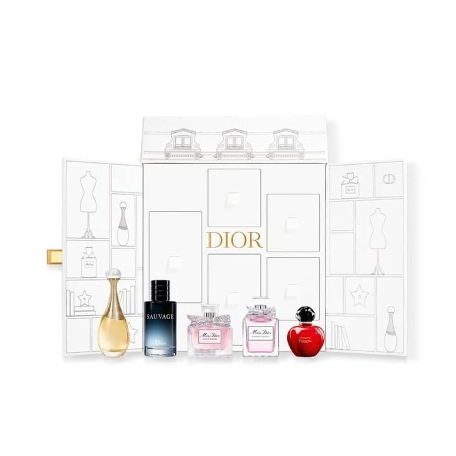 The surprise box from Dior exclusive contains 5 small perfumes spray with the bag