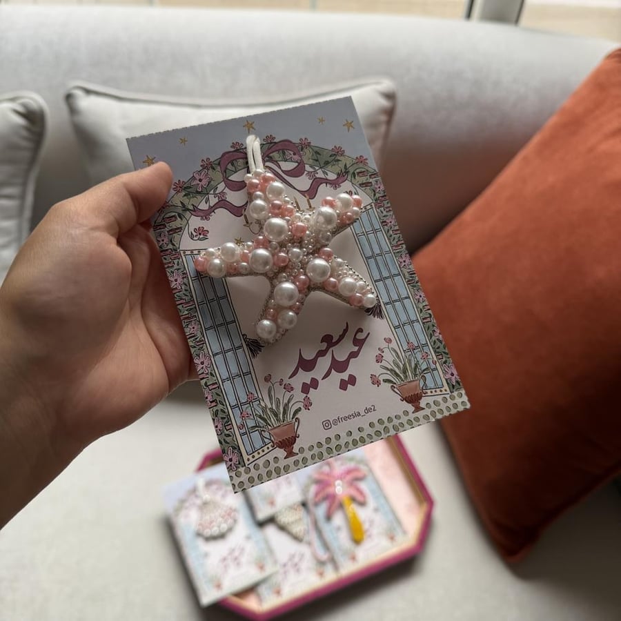 Star-shaped bead pendant with Eid card