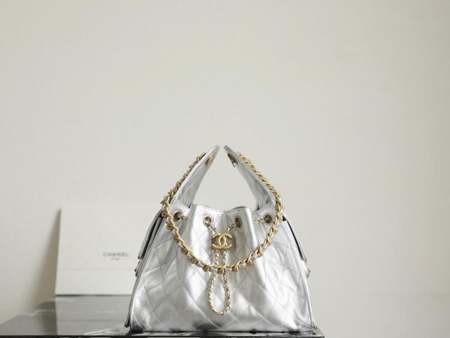 THE CHANEL 25 HANDBAG