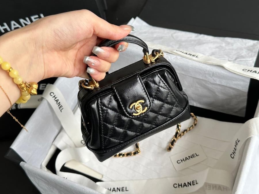 FLAP BAG WITH TOP HANDLE