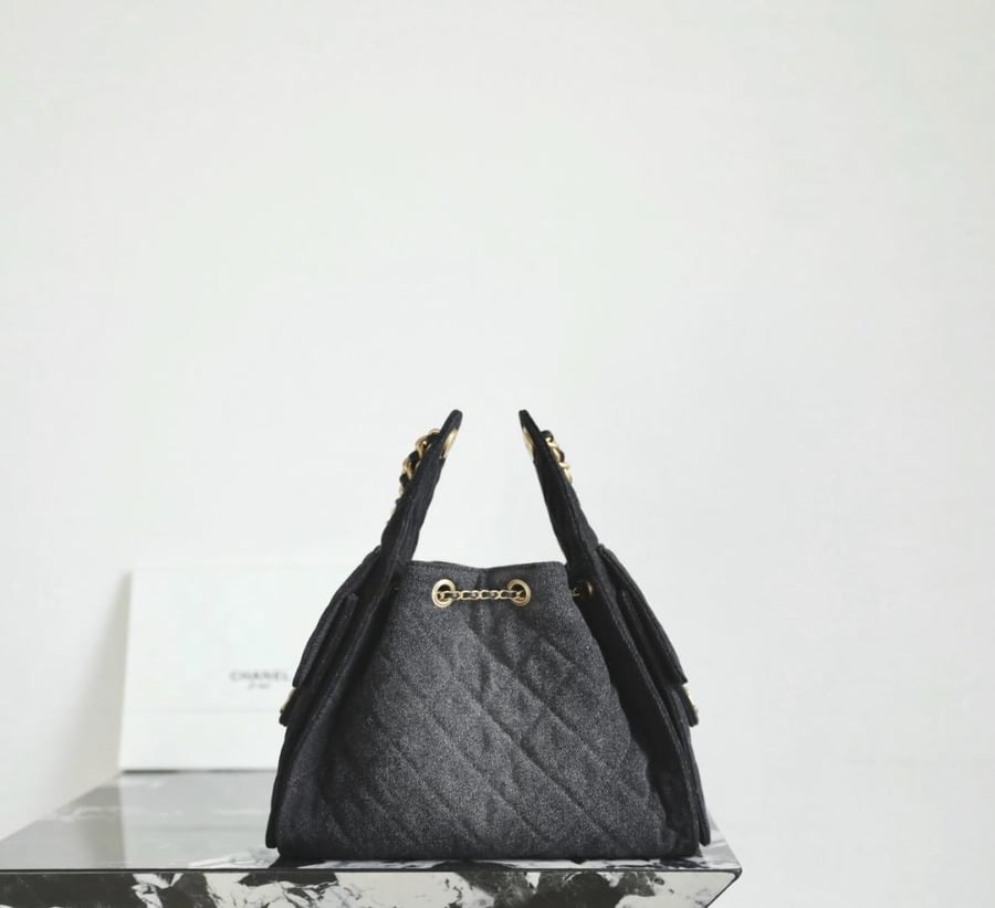THE CHANEL 25 HANDBAG