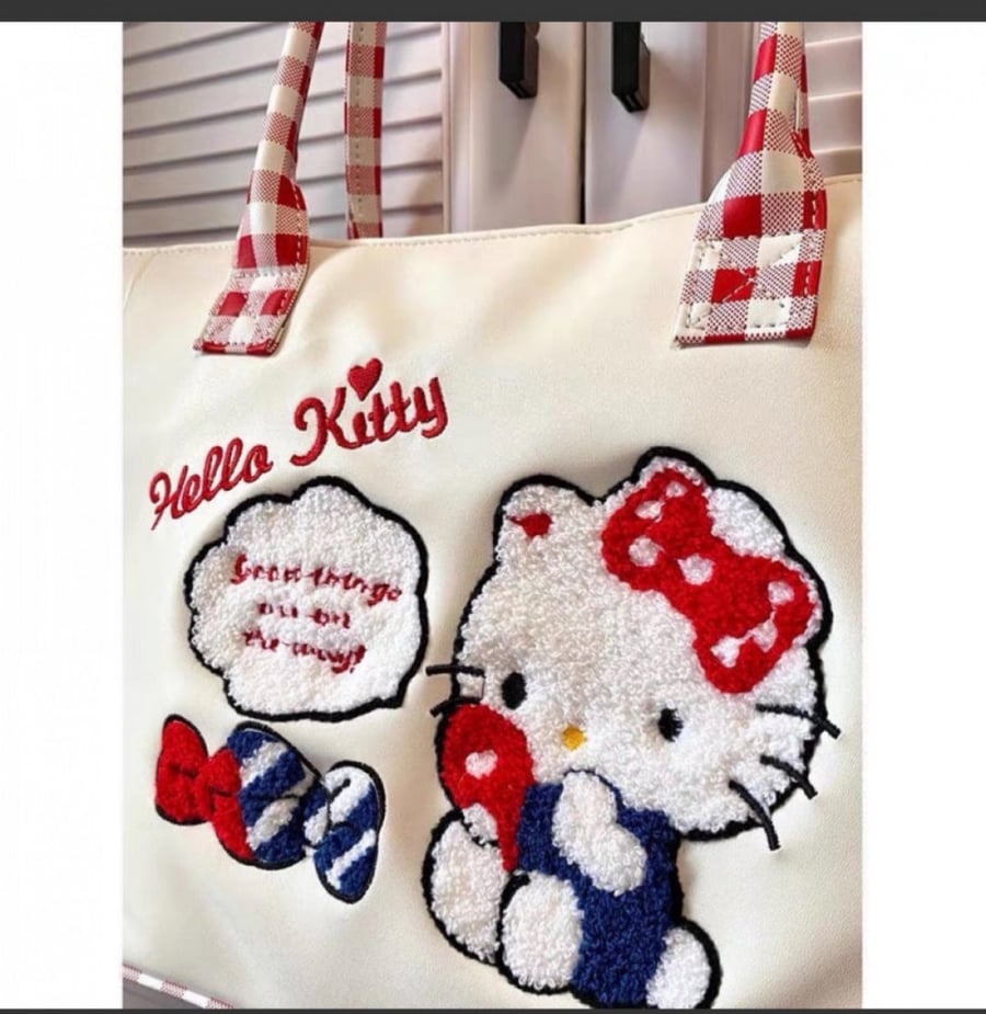 شنطة hello kitty