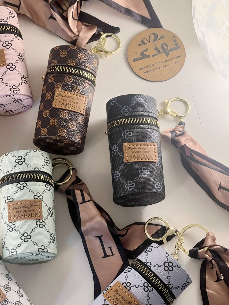 ميدالية حقيبة عطر او روج