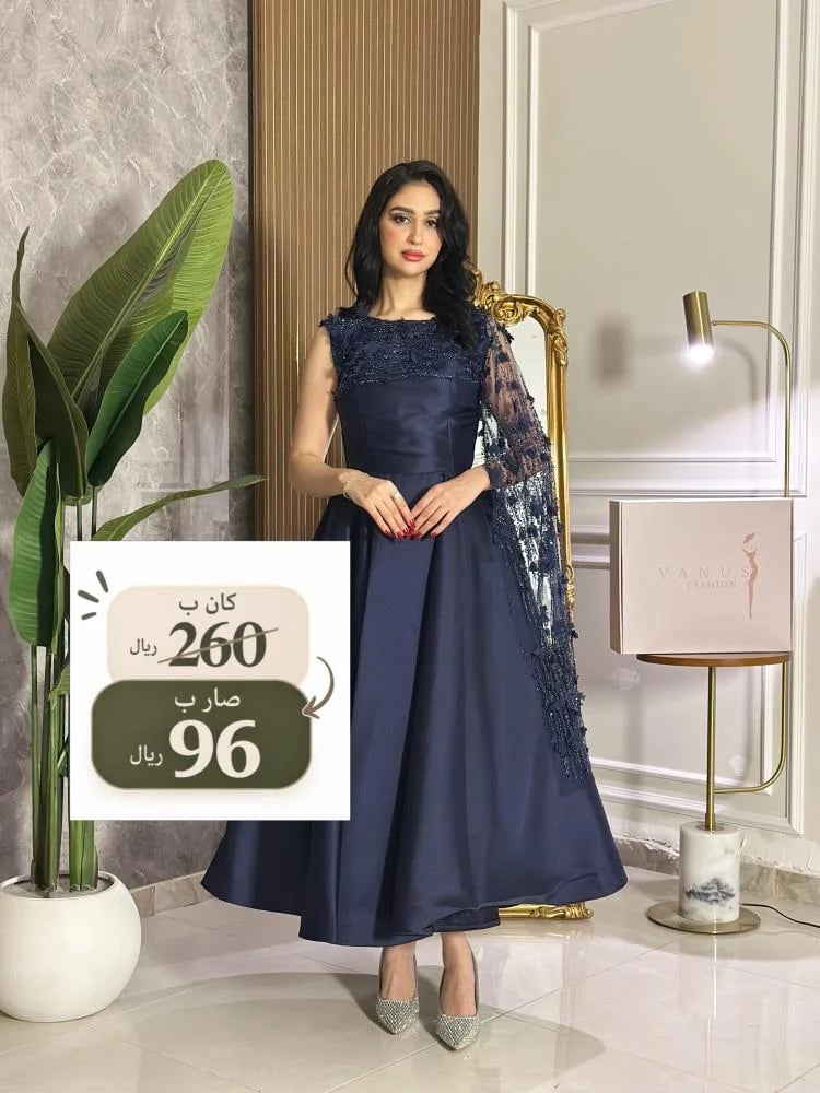7536- فستان سهرة كحلي ميدي منفوش بتطريز فاخر