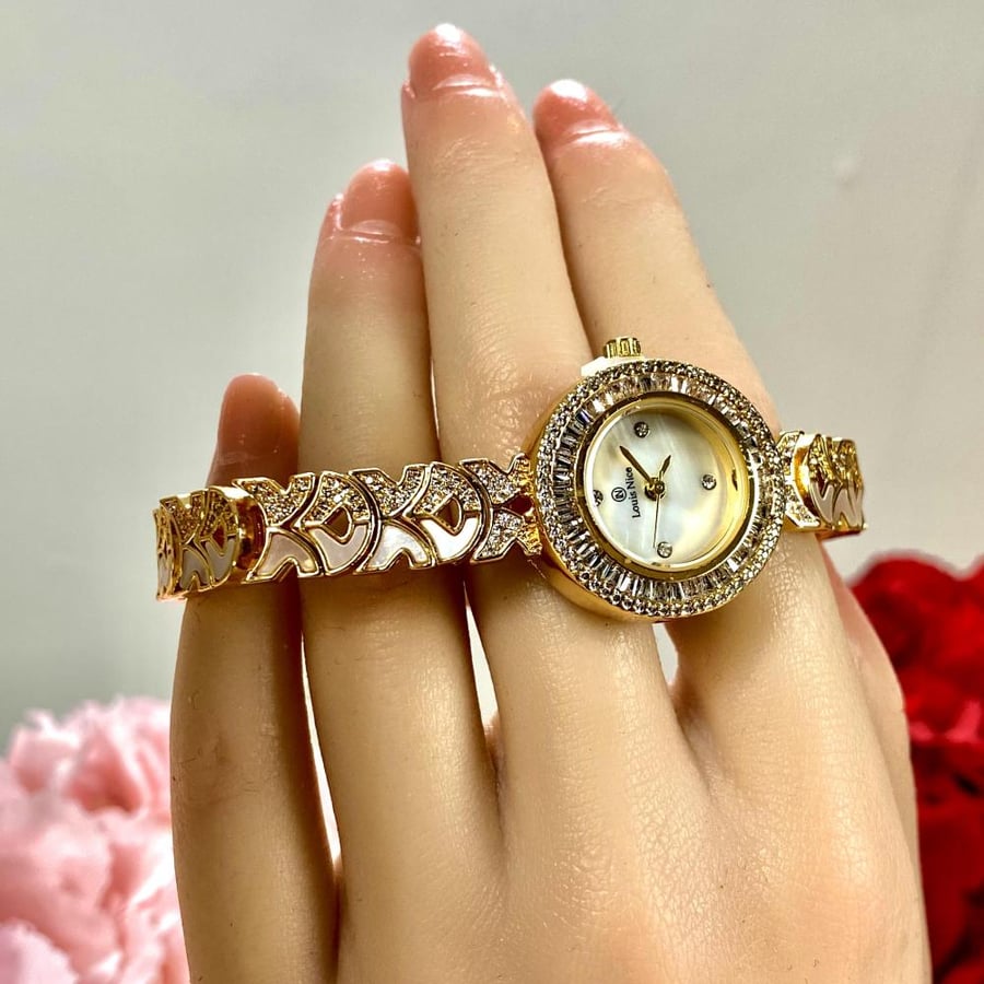 ساعة زركون بسوار زخرفي صدفي ذهبي