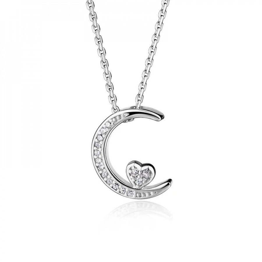Silver necklace in the shape of a moon encrusted with crystal