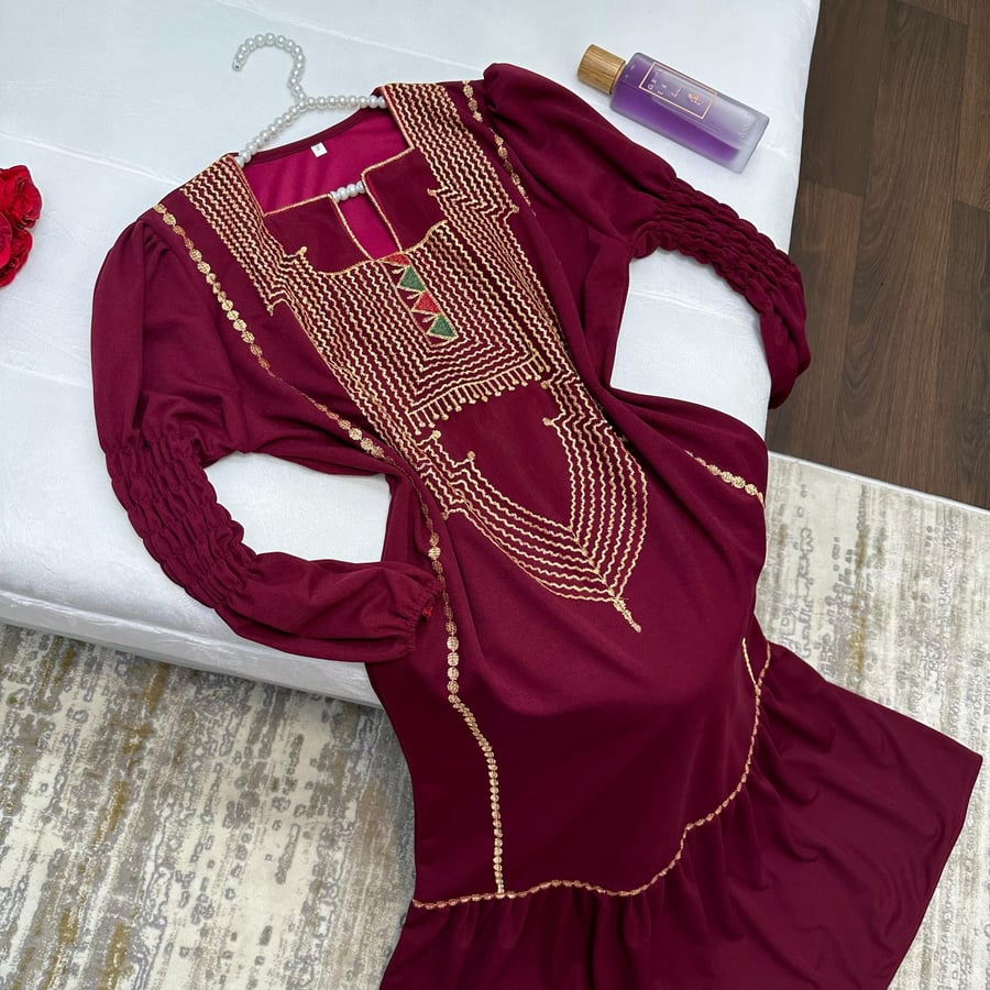 Aseri traditional gown with velvet fabric and golden decorations from Kuutchi