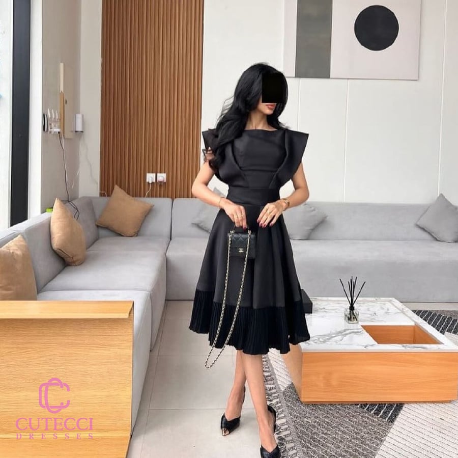 فستان سهرة أسود ميدي بكم مميز وتنورة بكسرات ميكادو أنيقة