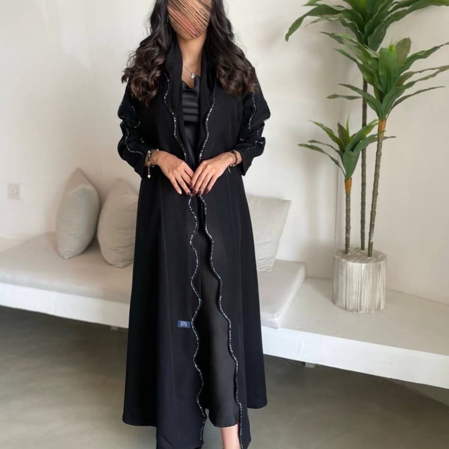 Crepe + hand embroidery in dark blue, black island with sleeves