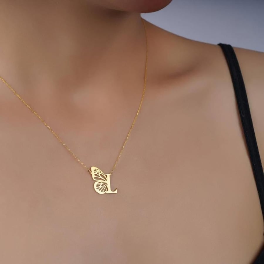 Letter pendant with the butterfly in an elegant design reflecting your elegance