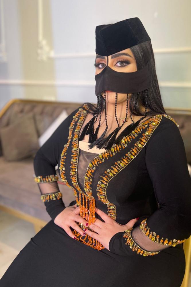 فستان شك يدوي اسود و اورنج