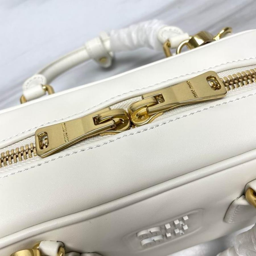 MiuMiu- Master Quality