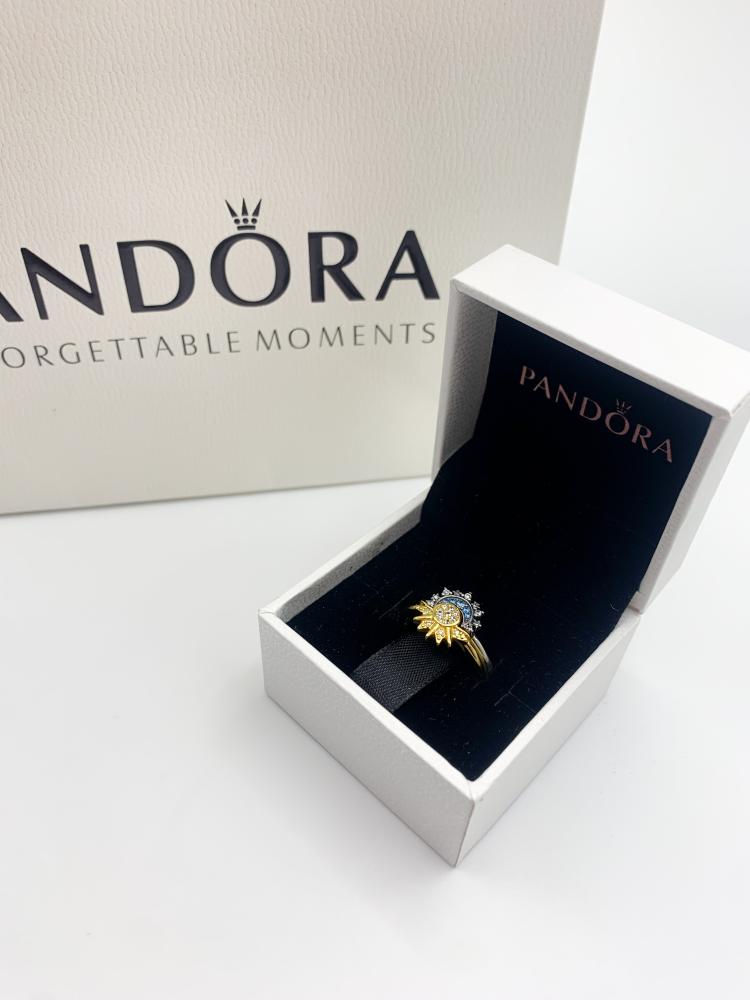 A ring inspired by Pandora the sun and the moon