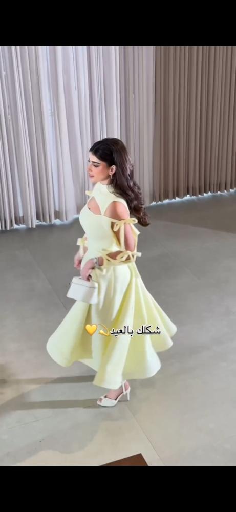 فستان سهرة أنيق مكشوف الاكتاف