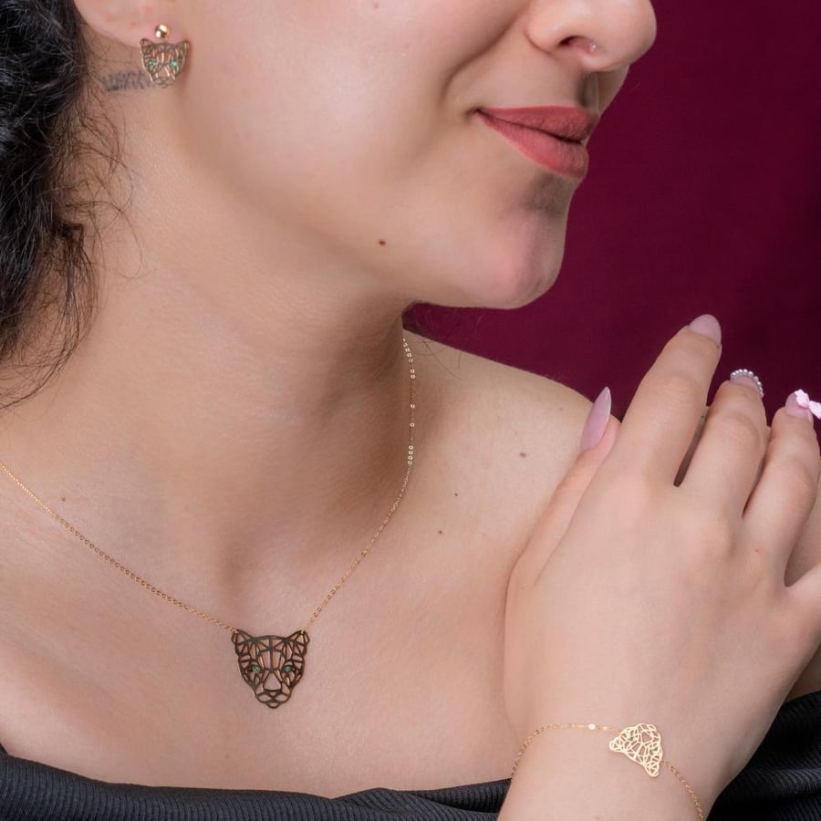 طقم ذهب صافي بتصميم النمر