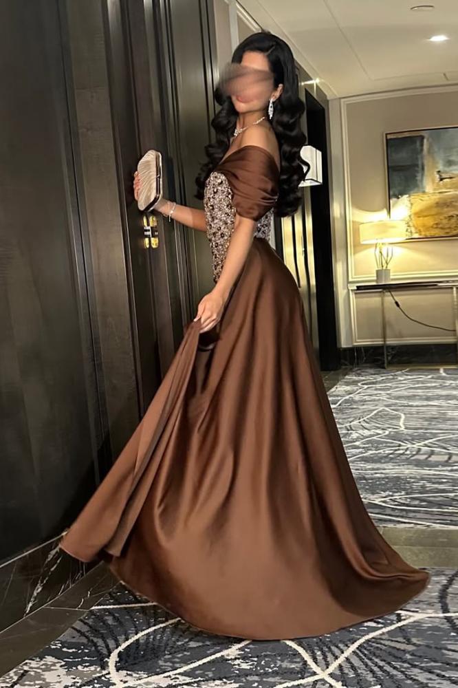 فستان سهره تفته المزين بالكلفه المطرزه