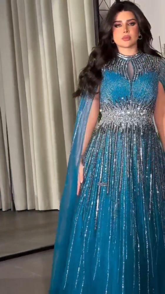 فستان سهره تل طبقات دبل كلوش  المزين بالتطريز كرستال وفصوص