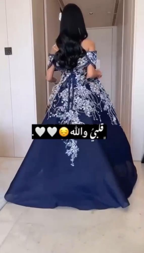 فستان سهره جازار دبل كلوش المزين بالتطريز اليدوي والورود