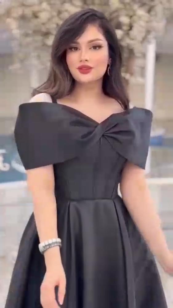 فستان اسود ميكادو دبل كلوش المزين بالفينكاء