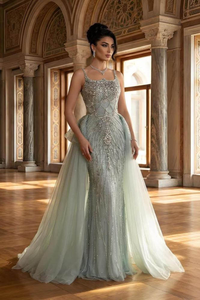 Evening dress decorated with embroidered tulle train