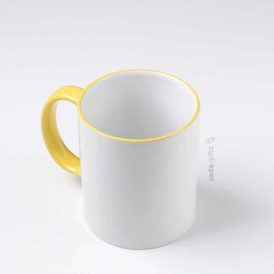 White ceramic mug with a colored handle