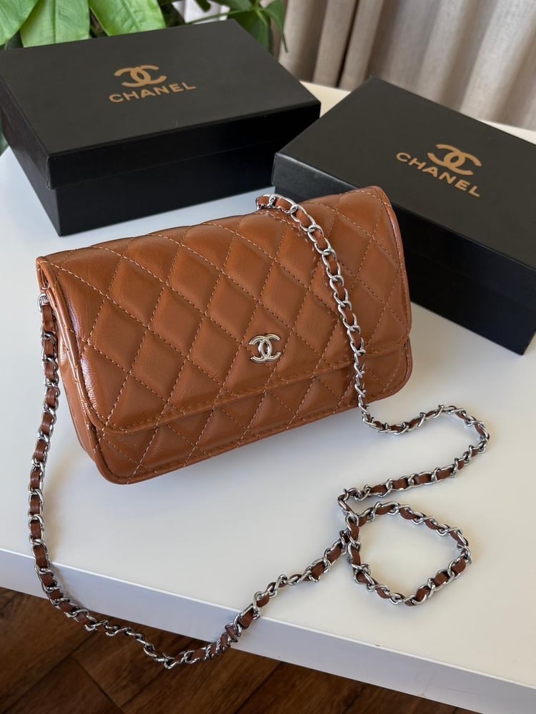 Women's Chanel bag with its accessories