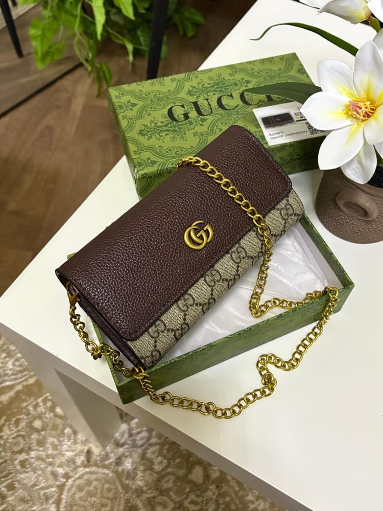 Women's bag Goyard with its accessories