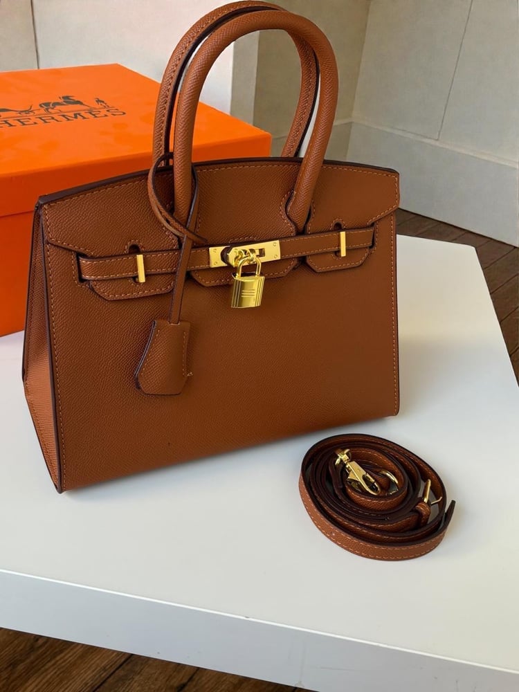 Women's bag Hermes with its accessories