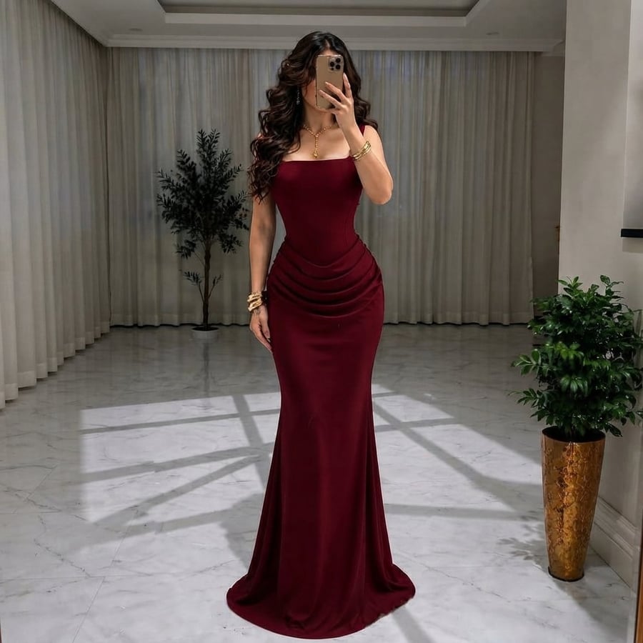 فستان سهرة عنابي بتصميم الكورسيه الفاخر وطيات الدرابيه الساحرة