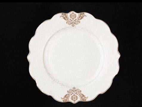 A set of fine porcelain tableware containing plates, bowls, serving dishes, cups, and enough for 6 people, consisting of 71 pieces, in gold color.