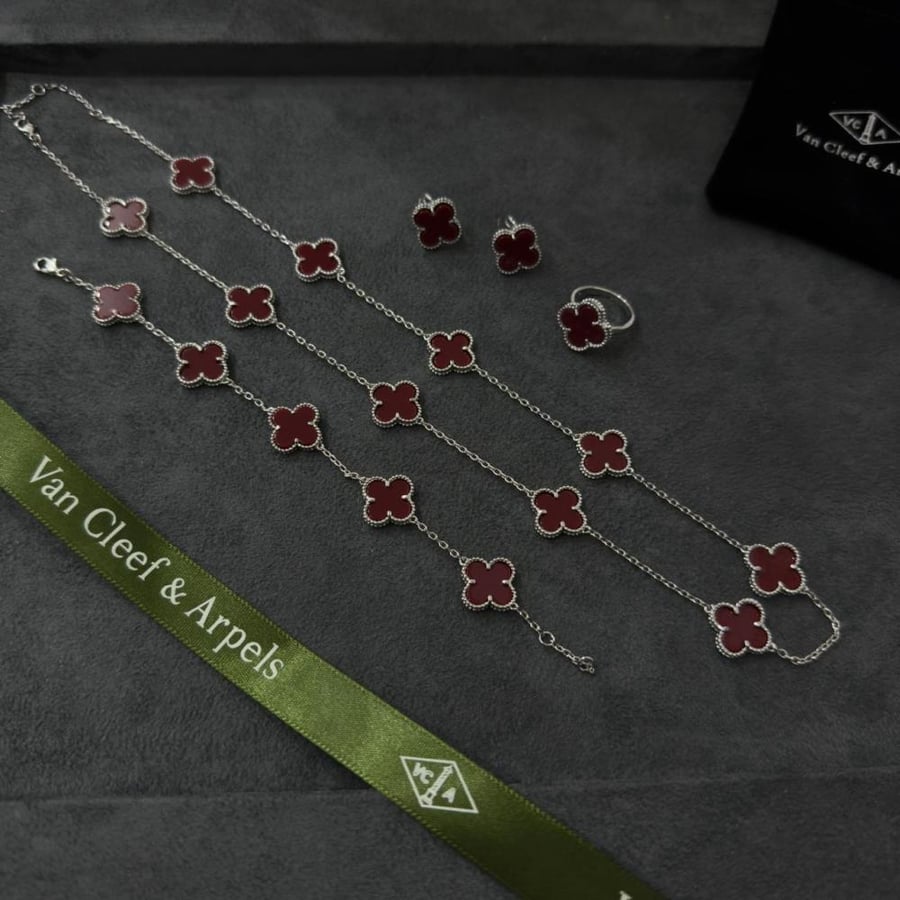 Van Cleef sets, 10 silver roses