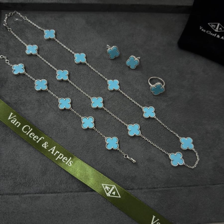 Van Cleef sets, 10 silver roses
